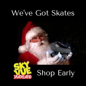 Santa holding a roller skate - We've got skates for Christmas. Shop Early.